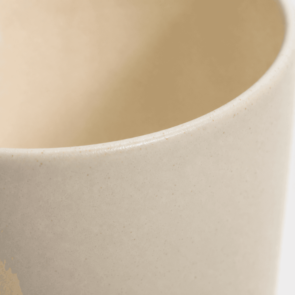 Material detail for a generic, unbranded cream ceramic mug